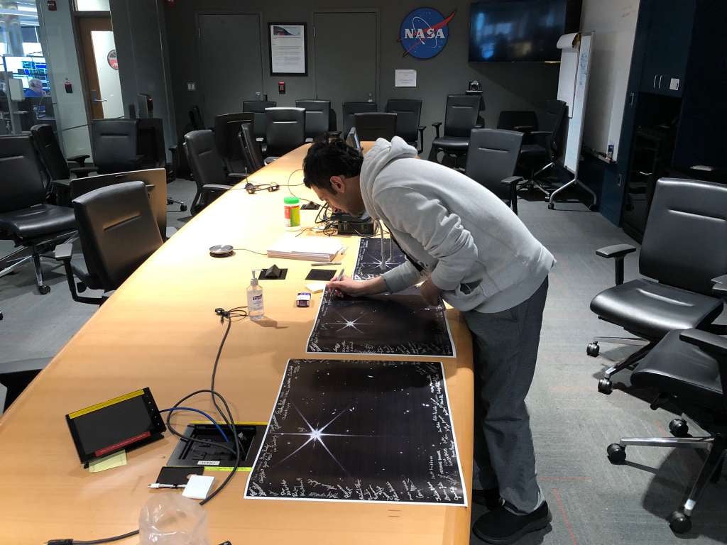 Signing at the image from James Webb Space Telescope. PHOTO: YASIR TUFAIL