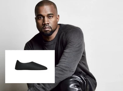 kanye west s yzy brand drops 20 yeezy slpr amid tension with adidas