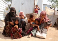 rawya hassan a mother of seven sits with her children outside their hut at the al bireen camp for displaced people who fled fighting between the houthis and forces of yemen s internationally recognized government in taiz province yemen september 17 2026 reuters