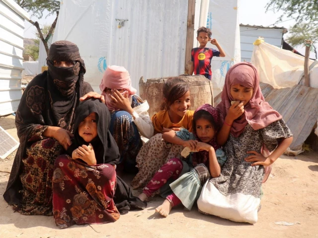 rawya hassan a mother of seven sits with her children outside their hut at the al bireen camp for displaced people who fled fighting between the houthis and forces of yemen s internationally recognized government in taiz province yemen september 17 2026 reuters rawya hassan a mother of seven sits with her children outside their hut at the al bireen camp for displaced people who fled fighting between the houthis and forces of yemen s internationally recognized government in taiz province yemen september 17 2026 reuters