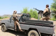 members of yemen s saudi backed government forces travel in a military pickup truck while patrolling a road leading to the front line where clashes with iran aligned houthi fighters are taking place in taiz province yemen september 30 2026 reuters