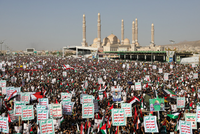 supporters of the houthi movement rally to denounce air strikes launched by the us and britain on houthi targets in sanaa yemen january 12 2024 photo reuters supporters of the houthi movement rally to denounce air strikes launched by the us and britain on houthi targets in sanaa yemen january 12 2024 photo reuters