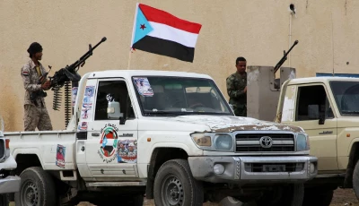 file photo security forces loyal to the separatist southern transitional council hold weapons while standing at the back of vehicles as they are deployed in the southern port city of aden yemen december 20 2020 photo reuters