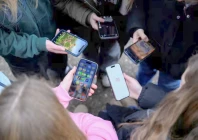 teenagers pose for a picture while looking at their phones in bonn germany february 20 2026 photo reuters