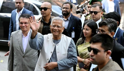 muhammad yunus c chief adviser of bangladesh s interim government gestures as he arrives to cast his ballot at a polling station during bangladesh s general election in dhaka on february 12 2026 bangladesh s interim leader muhammad yunus stepped down on february 16 2026 in a farewell broadcast to the nation before handing over to an elected government file photo afp