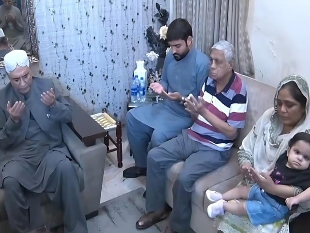 president zardari visiting the family of martyred captain muhammad ali qureshi in lahore on thursday screengrab