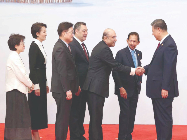 chinese president xi jinping welcomes president asif zardari and other heads of states in harbin photo ppi