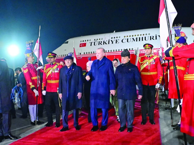 turkiye president recep tayyip erdogan walks with president asif zardari prime minister shehbaz sharif after arrival at the nur khan airbase photo express turkiye president recep tayyip erdogan walks with president asif zardari prime minister shehbaz sharif after arrival at the nur khan airbase photo express