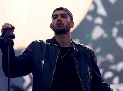 zayn malik says he was kicked off tinder for catfishing