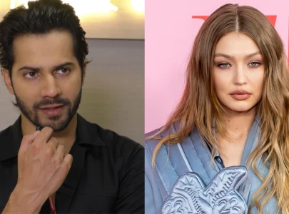 it was planned varun dhawan clarifies after backlash for lifting gigi hadid at nmacc performance